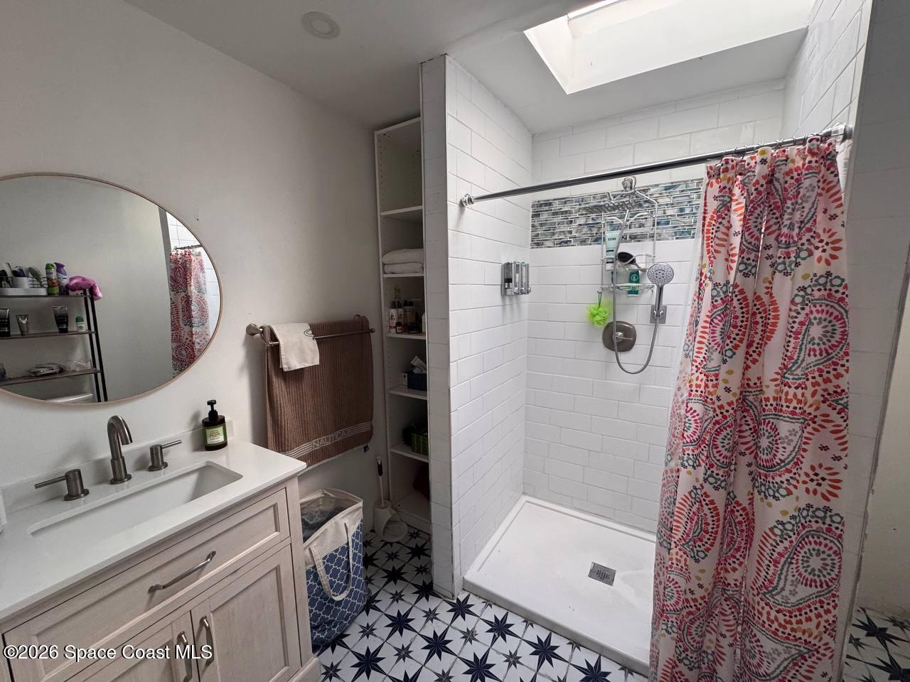1340 Northwest 112th Street Miami, FL 33167 - Photo 13 of 20 a bathroom with a sink toilet and shower