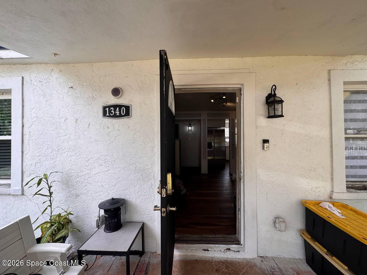 1340 Northwest 112th Street Miami, FL 33167 - Photo 18 of 20 a view of entryway with livingroom