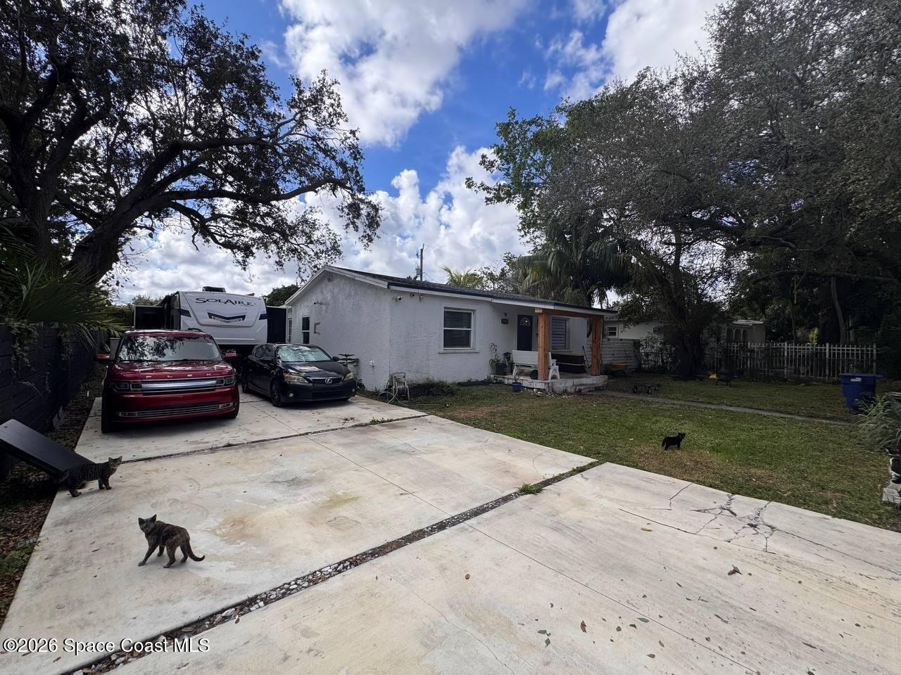 1340 Northwest 112th Street Miami, FL 33167 - Photo 19 of 20 a view of a house with a yard