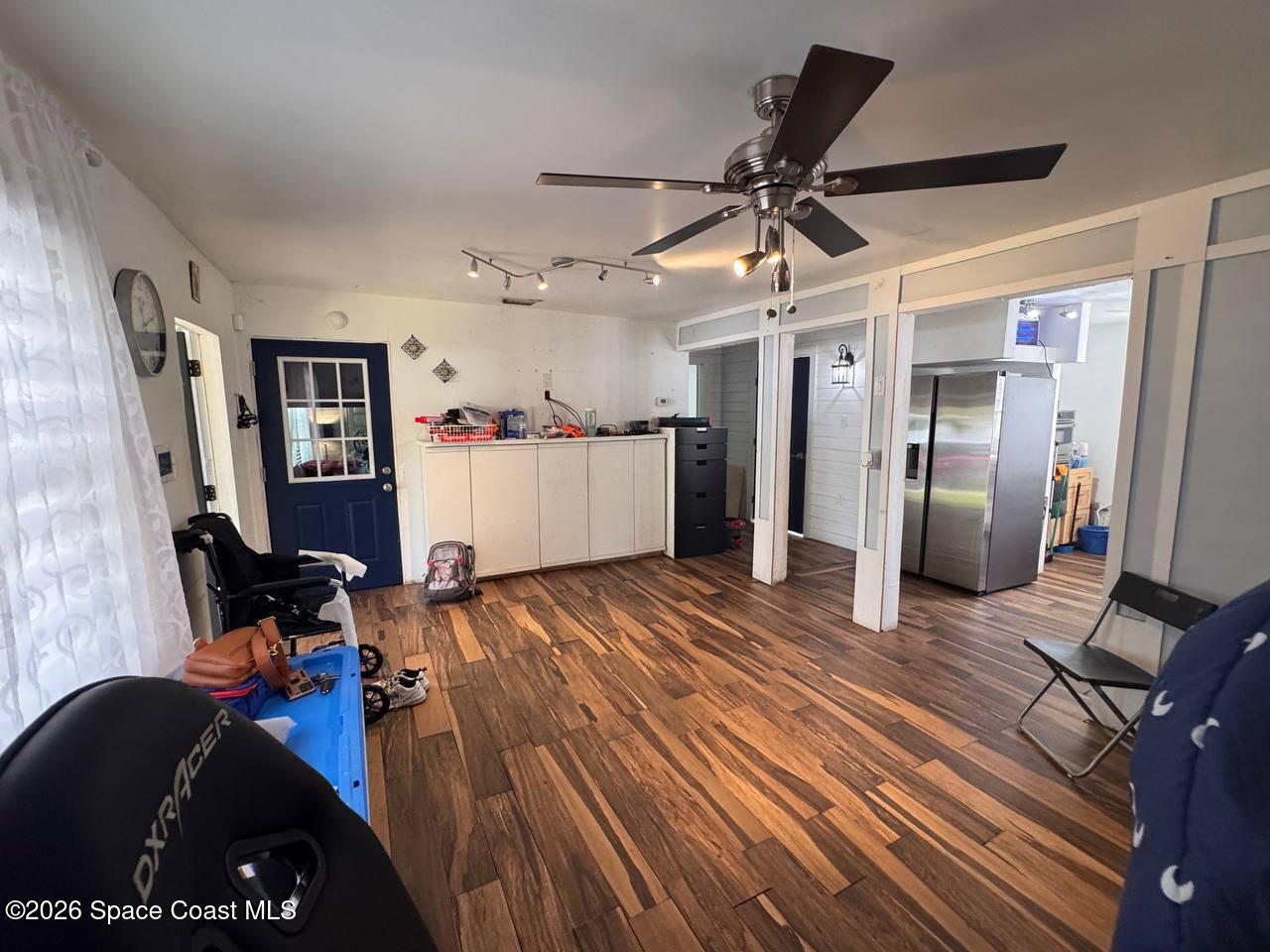 1340 Northwest 112th Street Miami, FL 33167 - Photo 8 of 20 a view of a living room and wooden floor