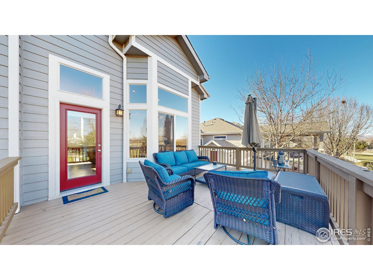 8368 Castaway Drive Windsor, CO 80528 - Photo 11 of 40 Easy patio access off of kitchen to capture those mountain views for great upcoming summer weather