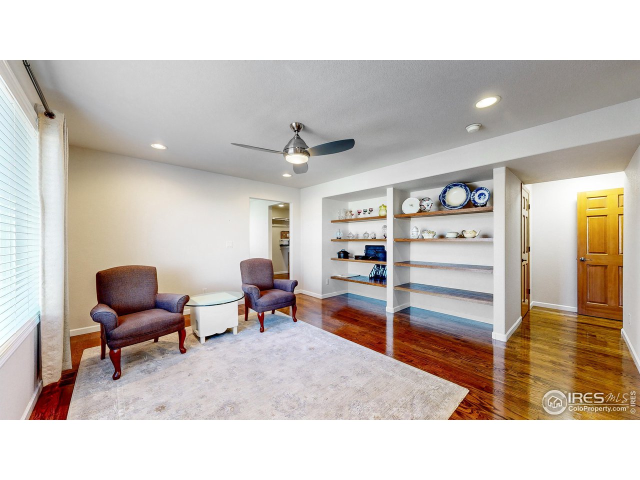 8368 Castaway Drive Windsor, CO 80528 - Photo 14 of 40 Newly added secondary or primary main level en-suite space with loads of options: office, separate living quarters, den? Possibilities are endless