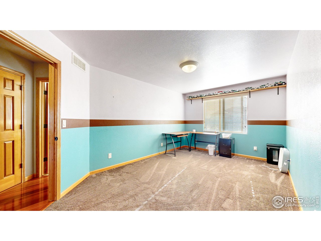 8368 Castaway Drive Windsor, CO 80528 - Photo 23 of 40 Huge upstairs bedroom #2 with walk in closet all solid core doors throughout upstairs! NEW CARPET ON ORDER!