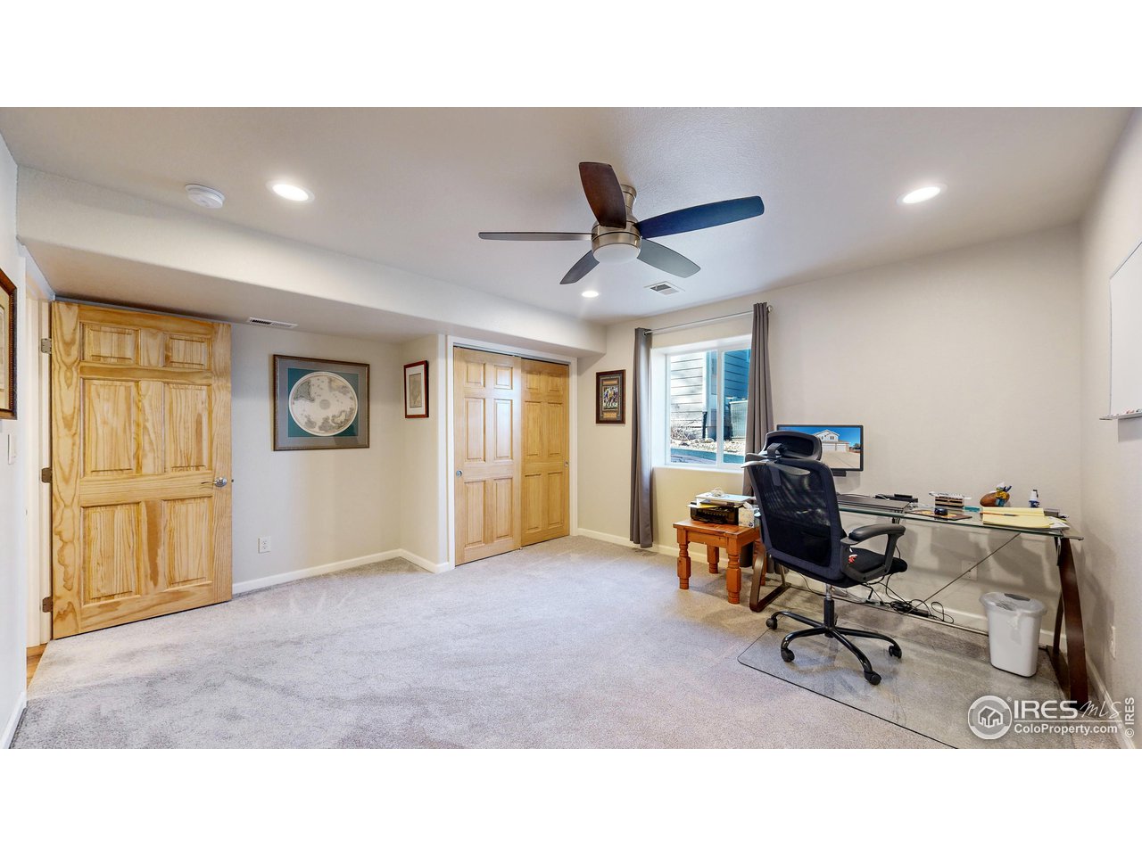 8368 Castaway Drive Windsor, CO 80528 - Photo 28 of 40 5th large bedroom in basement with daylit window