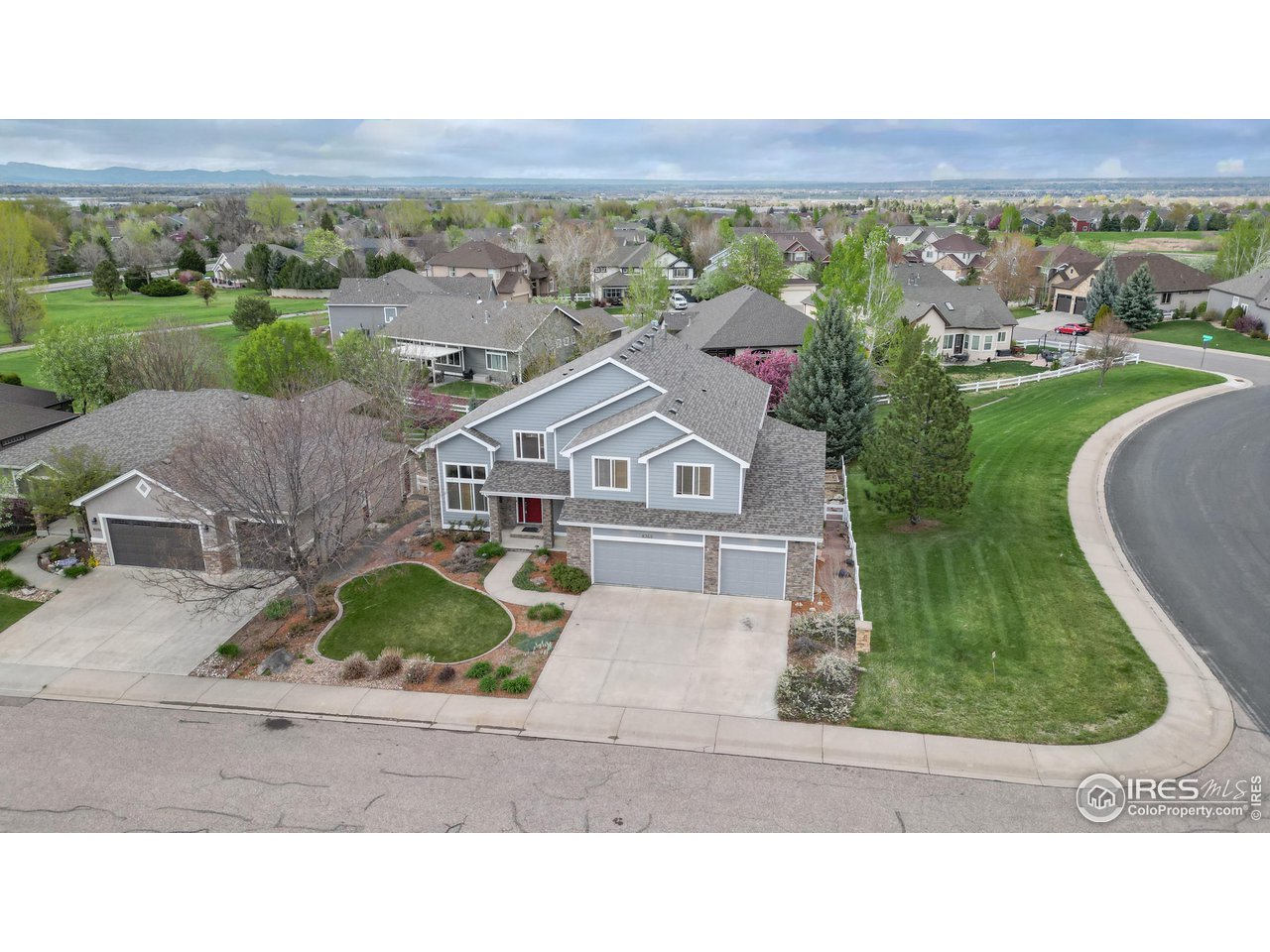 8368 Castaway Drive Windsor, CO 80528 - Photo 37 of 40 Beautiful corner lot siding and backing to ample green space fronting to a great cul de sac location.