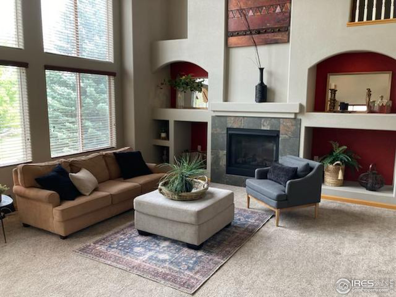 8368 Castaway Drive Windsor, CO 80528 - Photo 5 of 40 Beautiful great room off of kitchen with loads of windows to take in the views and natural light!