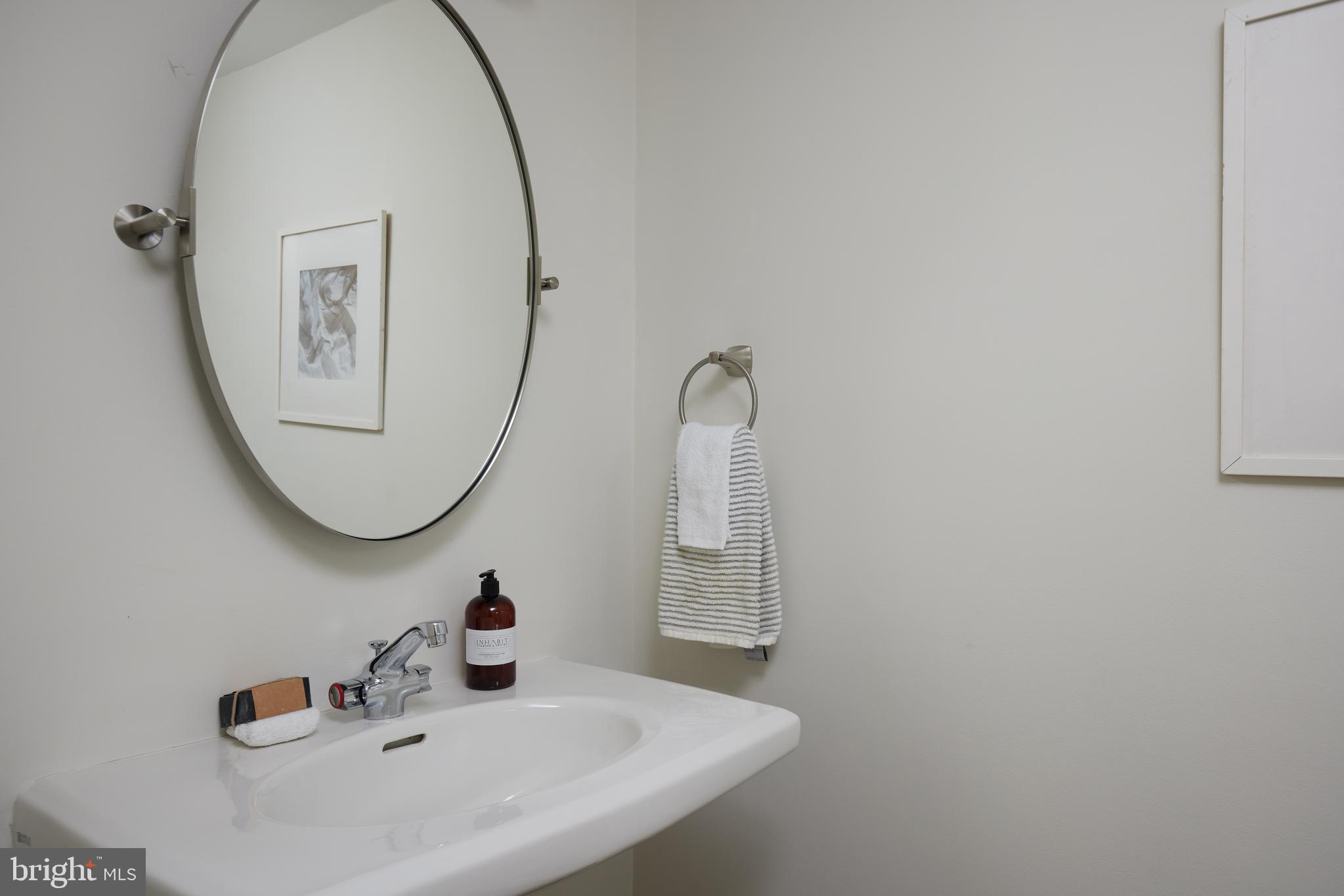 1802 Kalorama Square, Unit 16 Washington, DC 20008 - Photo 11 of 58 a bathroom with a sink and a mirror