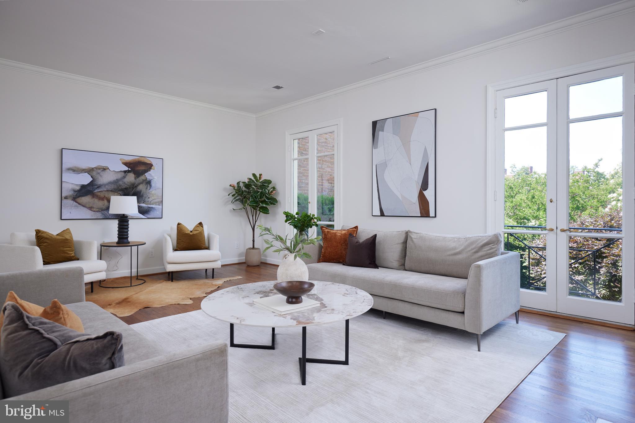 1802 Kalorama Square, Unit 16 Washington, DC 20008 - Photo 24 of 58 a living room with furniture and a large window