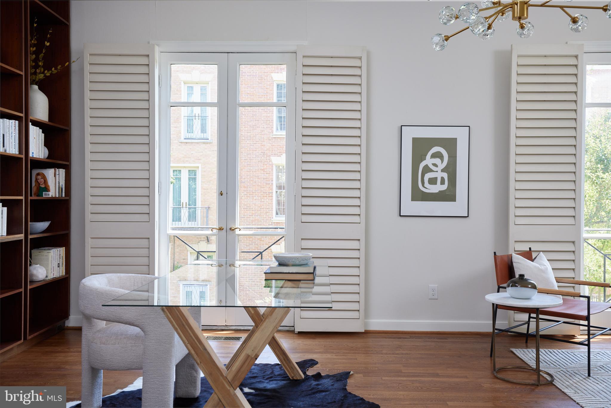 1802 Kalorama Square, Unit 16 Washington, DC 20008 - Photo 28 of 58 a view of a workspace with furniture and a window