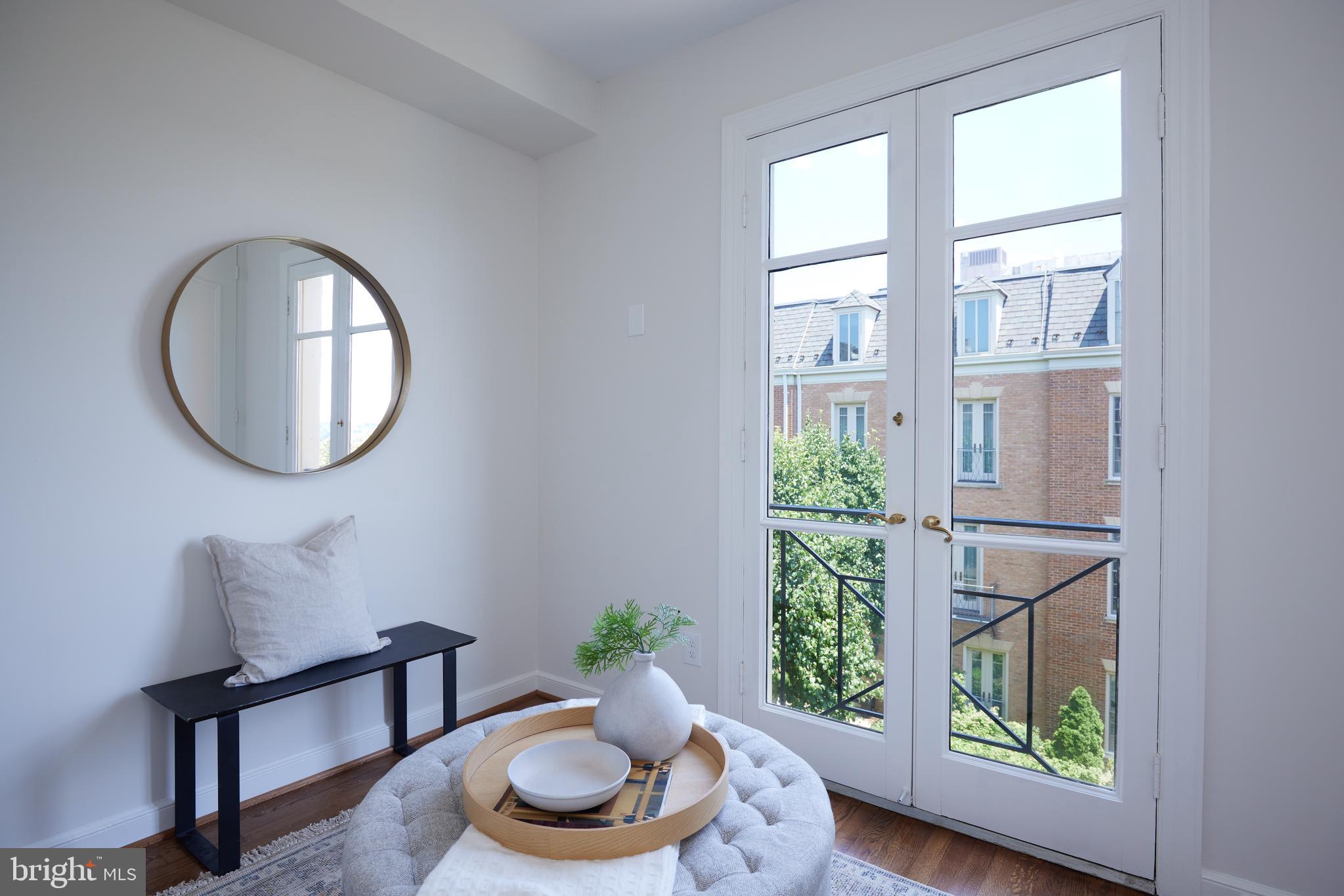 1802 Kalorama Square, Unit 16 Washington, DC 20008 - Photo 36 of 58 a room with furniture and a window