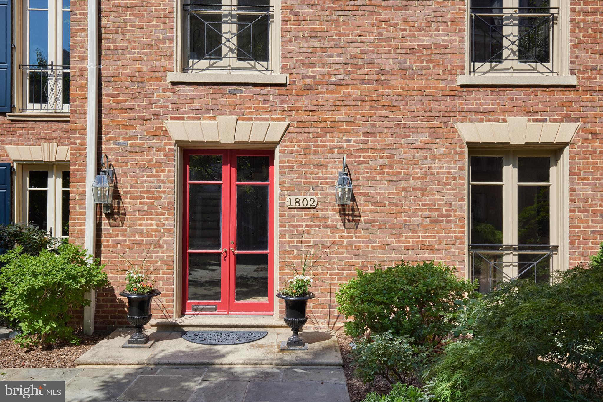 1802 Kalorama Square, Unit 16 Washington, DC 20008 - Photo 4 of 58 a front view of a house with glass windows