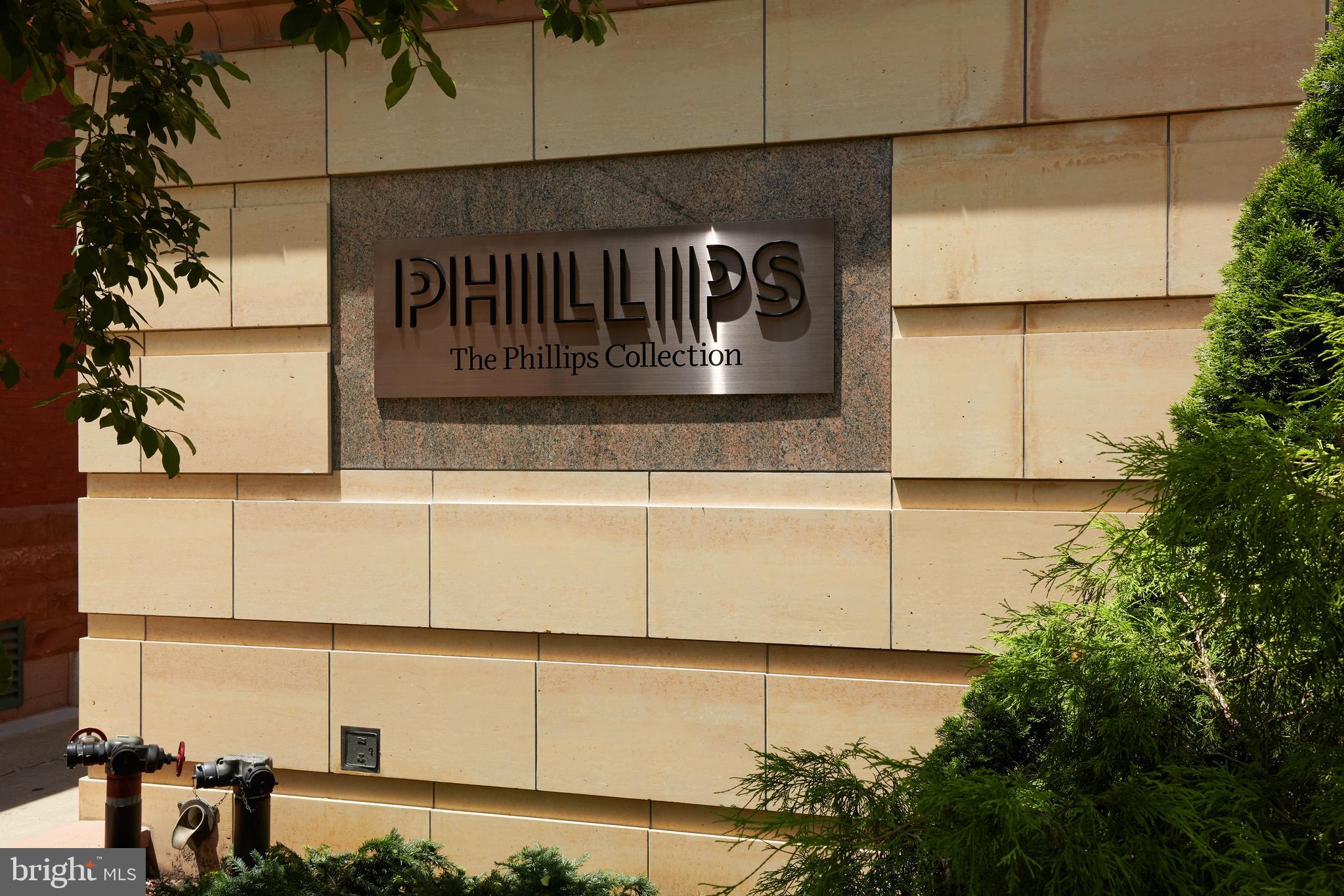 1802 Kalorama Square, Unit 16 Washington, DC 20008 - Photo 57 of 58 a view of a street sign and a potted plant