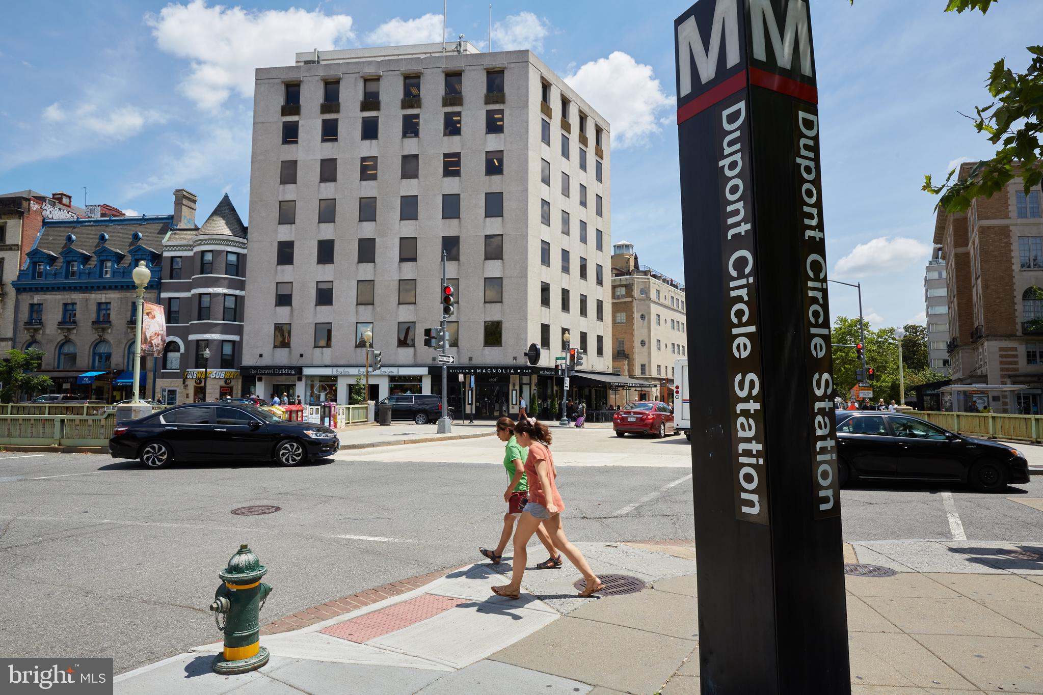 1802 Kalorama Square, Unit 16 Washington, DC 20008 - Photo 58 of 58 a street with tall buildings and cars parked on road