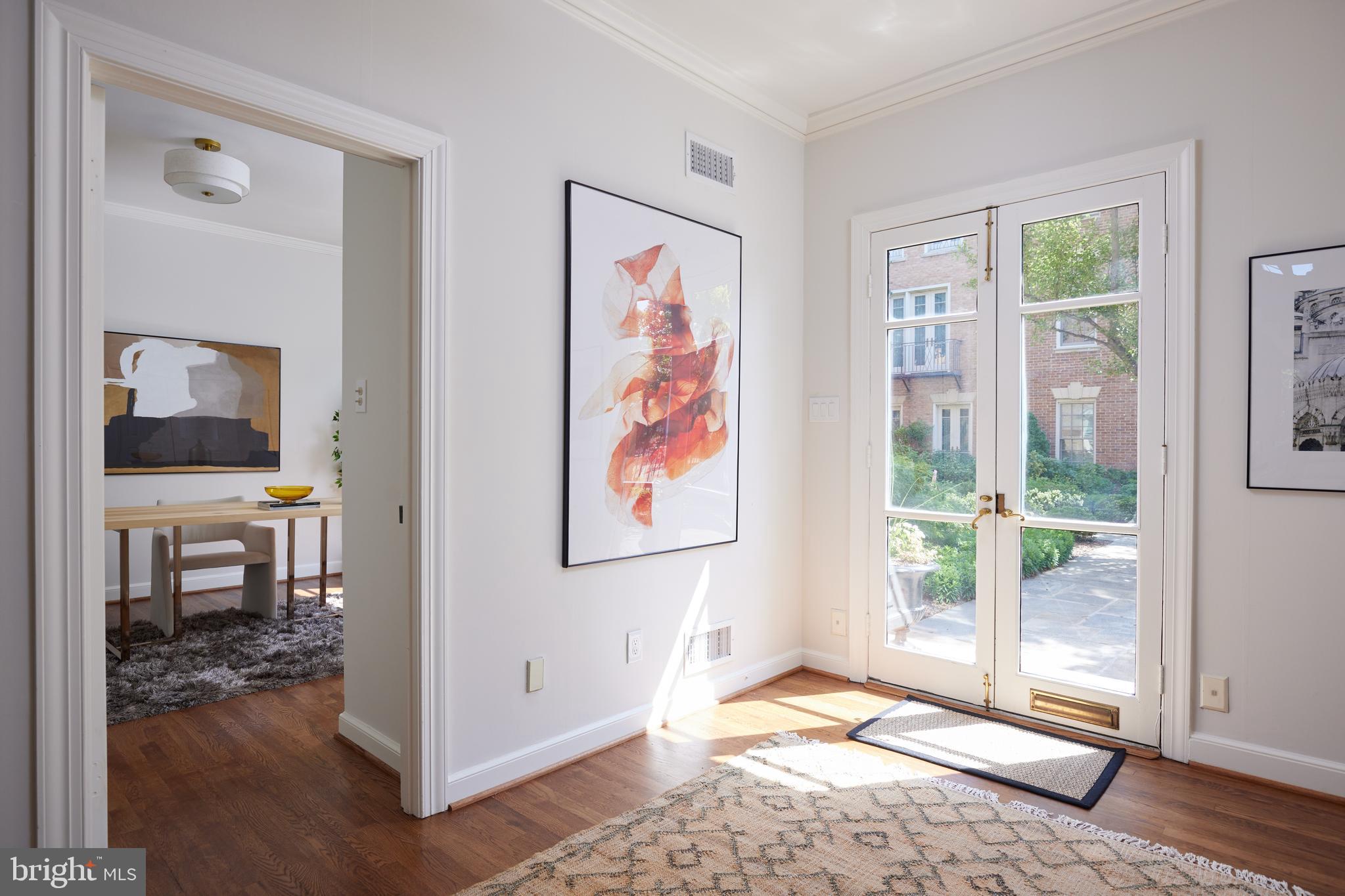 1802 Kalorama Square, Unit 16 Washington, DC 20008 - Photo 8 of 58 a very nice looking room with a large window and a living room