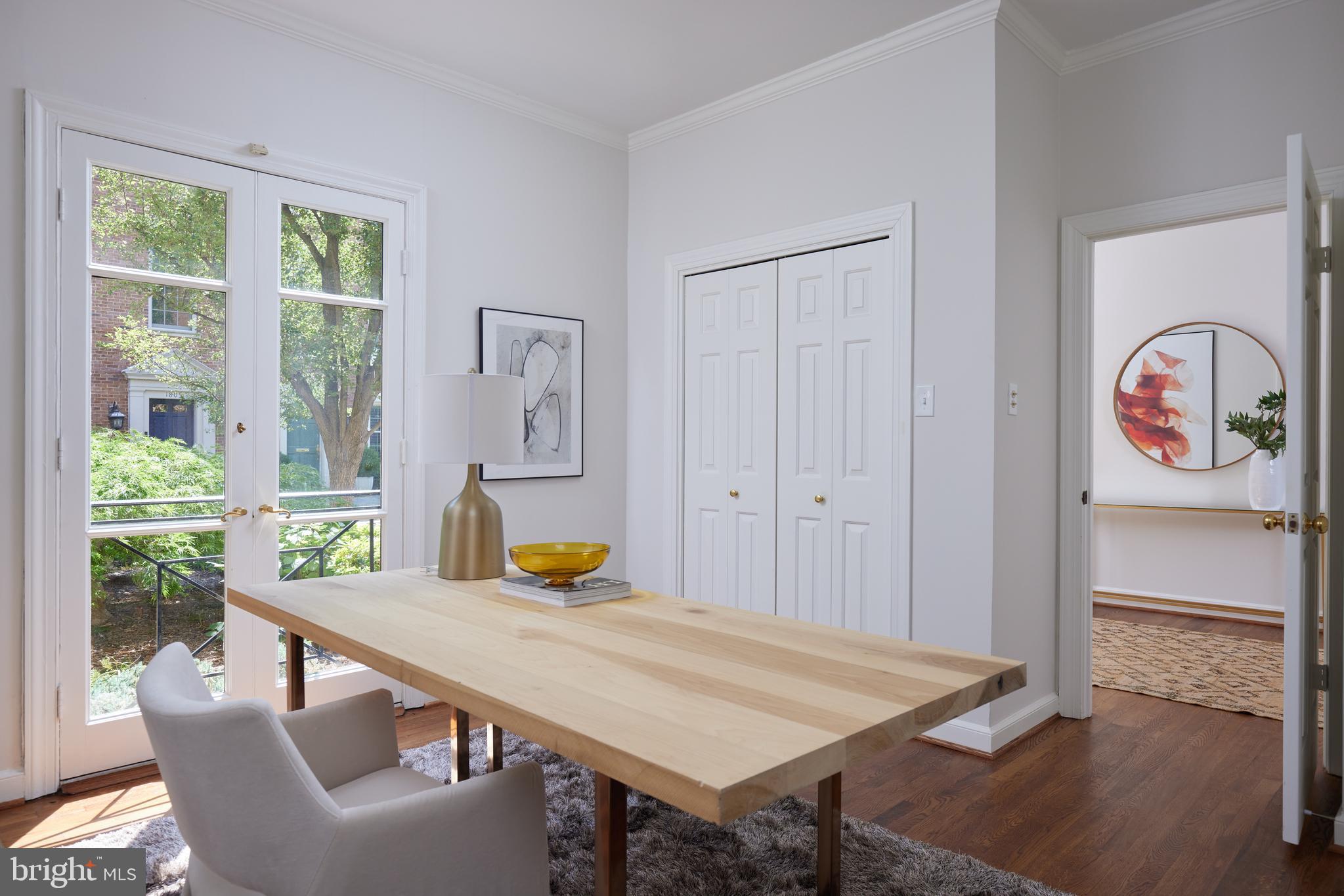 1802 Kalorama Square, Unit 16 Washington, DC 20008 - Photo 10 of 58 a view of a dining room with furniture window and outside view