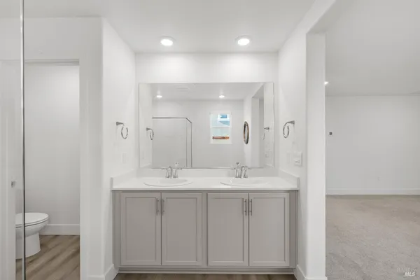 a view of an empty walk in closet