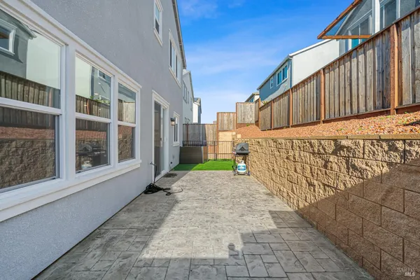 a view of a balcony with wooden floor