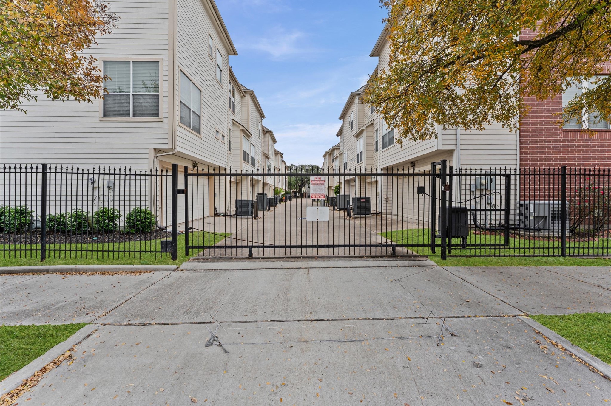 2905 Crawford Street Houston, TX 77004 - Photo 27 of 28 a view of a house with a small yard and a large tree