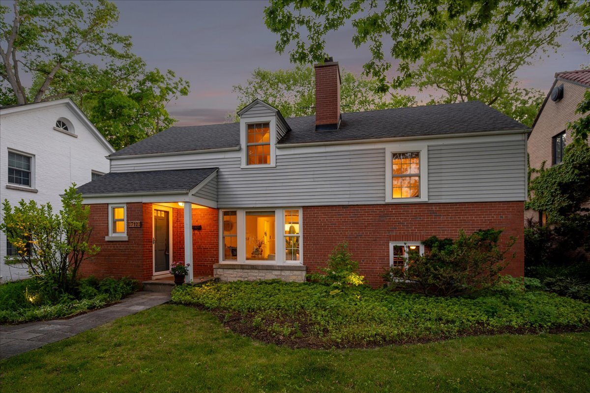712 Juniper Road Glenview, IL 60025 - Photo 28 of 33 a front view of a house with a garden