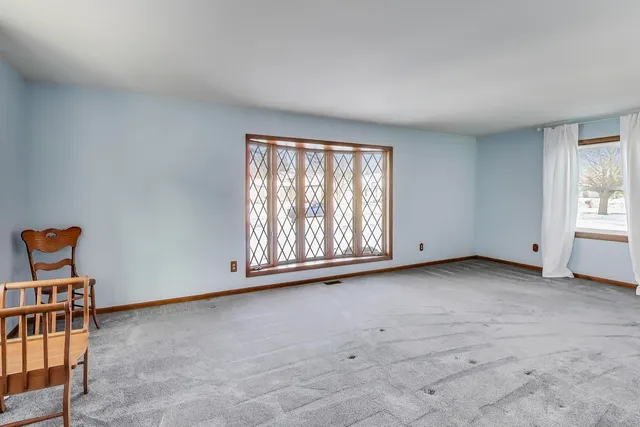 an empty room with windows