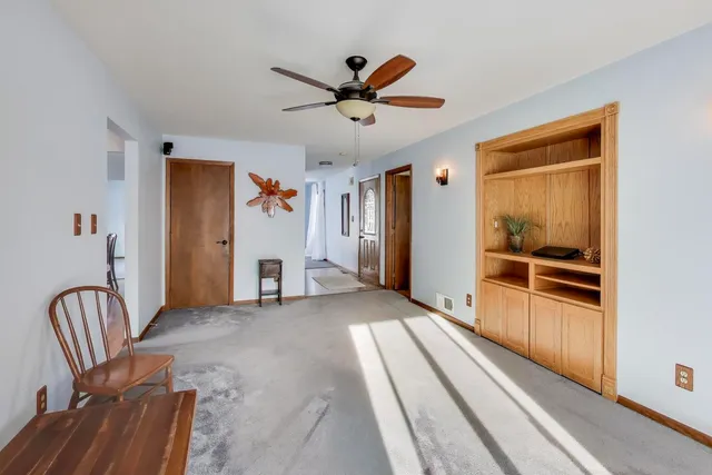 a view of a hallway with a workspace