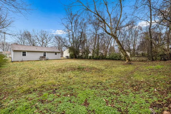 a house view with yard in front of it