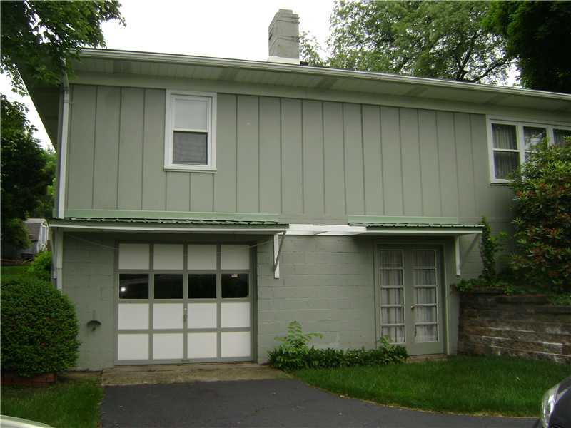 949 Harper Road Crescent, PA 15046 - Photo 6 of 24 Exterior Back. Easy access from garage to interior of the house or French doors for a party in the lower level.
