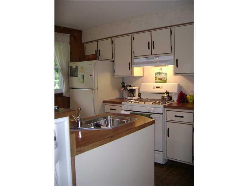 949 Harper Road Crescent, PA 15046 - Photo 9 of 24 Kitchen. Gas stove and plenty of cabinets for storage.