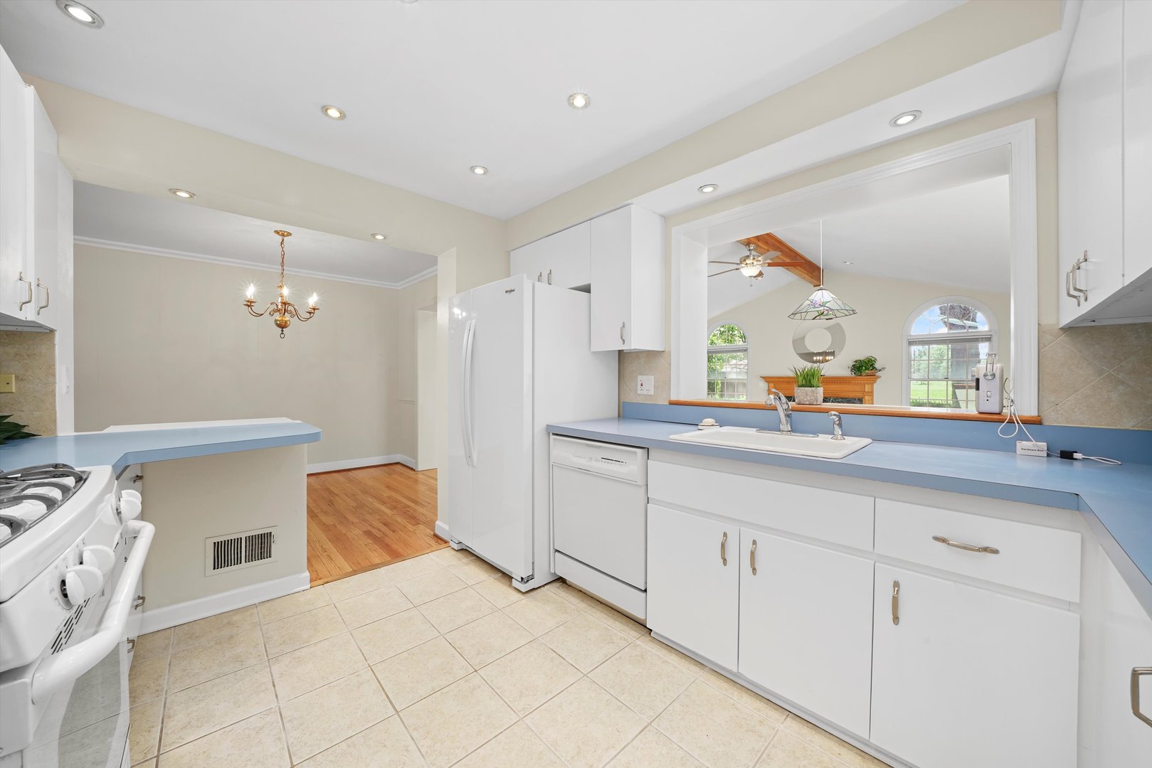 2525 Glenview Road Glenview, IL 60025 - Photo 15 of 50 a kitchen with granite countertop white cabinets and white appliances