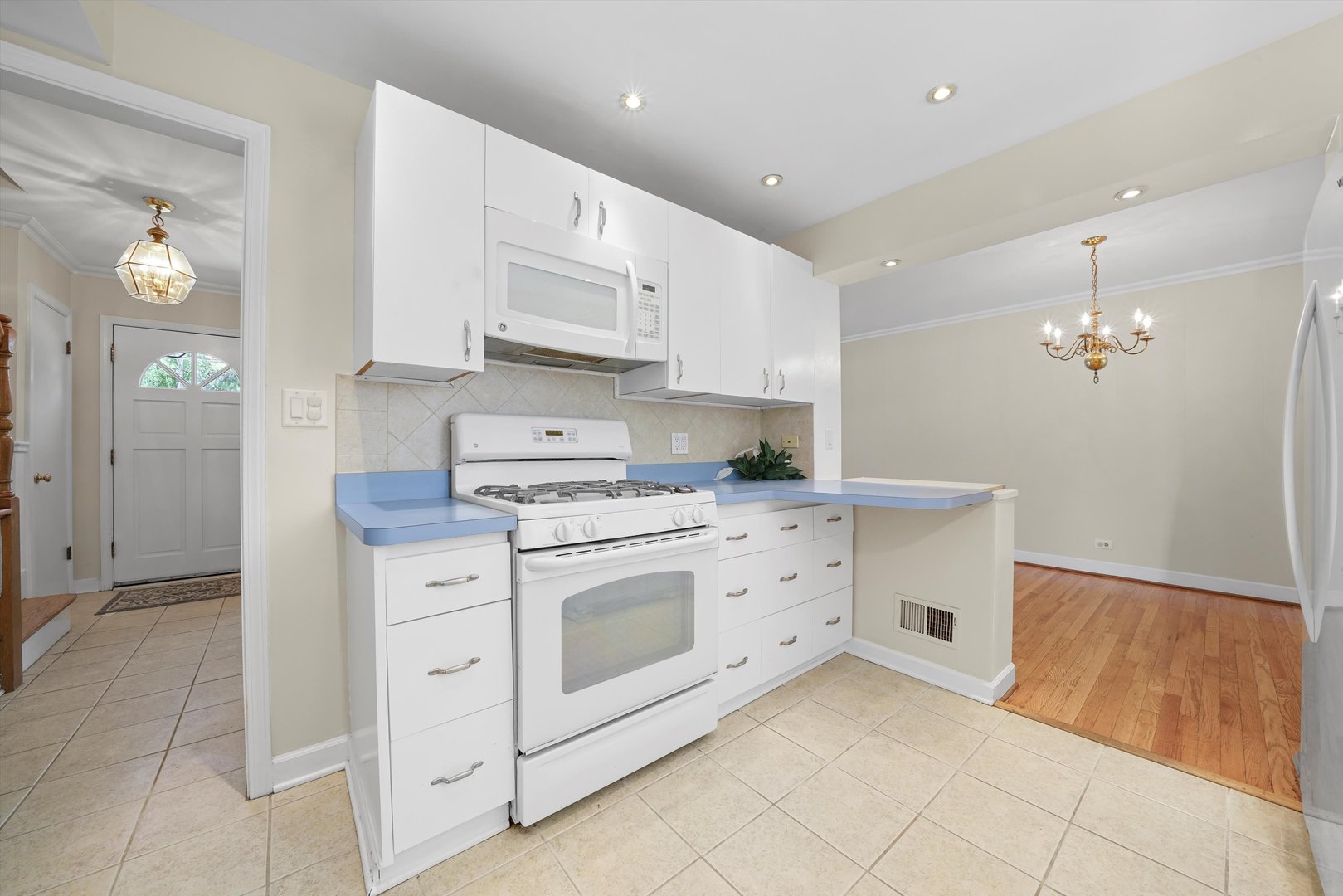 2525 Glenview Road Glenview, IL 60025 - Photo 16 of 50 a kitchen with white cabinets and appliances