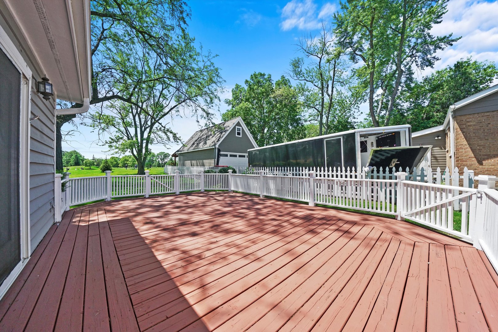 2525 Glenview Road Glenview, IL 60025 - Photo 23 of 50 a view of outdoor space with deck and wooden floor