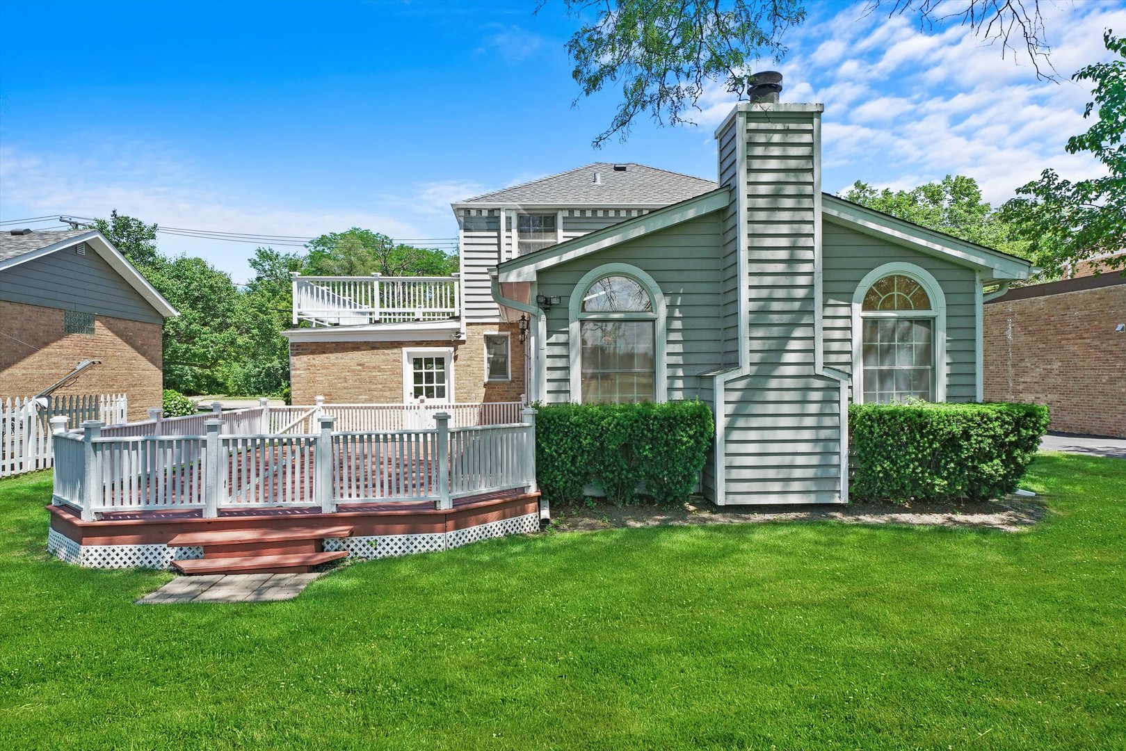 2525 Glenview Road Glenview, IL 60025 - Photo 25 of 50 a view of a house with a yard and deck