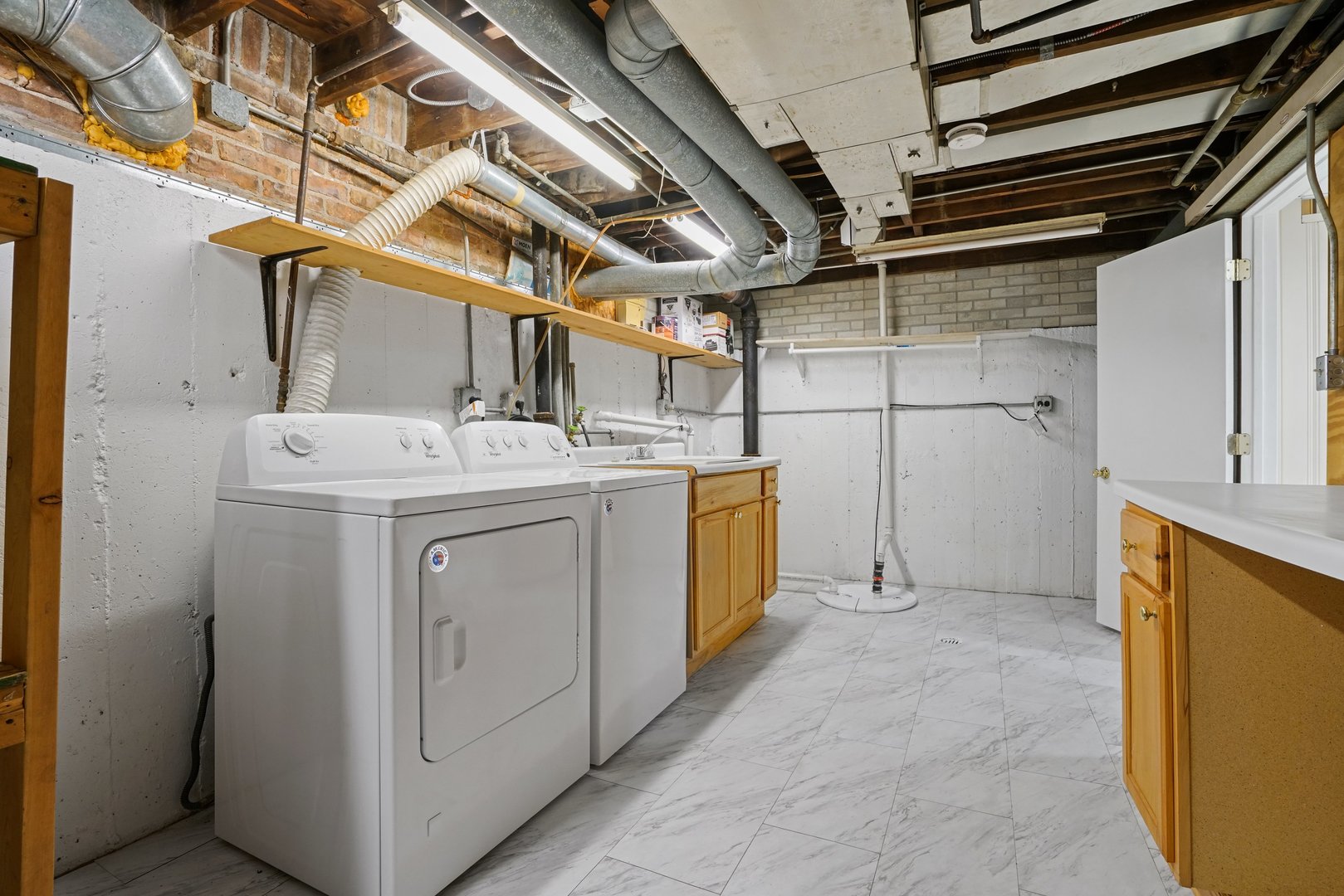 2525 Glenview Road Glenview, IL 60025 - Photo 38 of 50 a utility room with dryer and washer