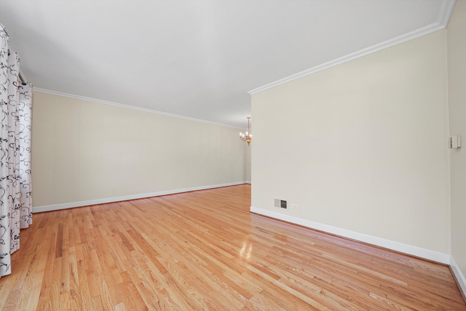 2525 Glenview Road Glenview, IL 60025 - Photo 7 of 50 a view of an empty room with wooden floor