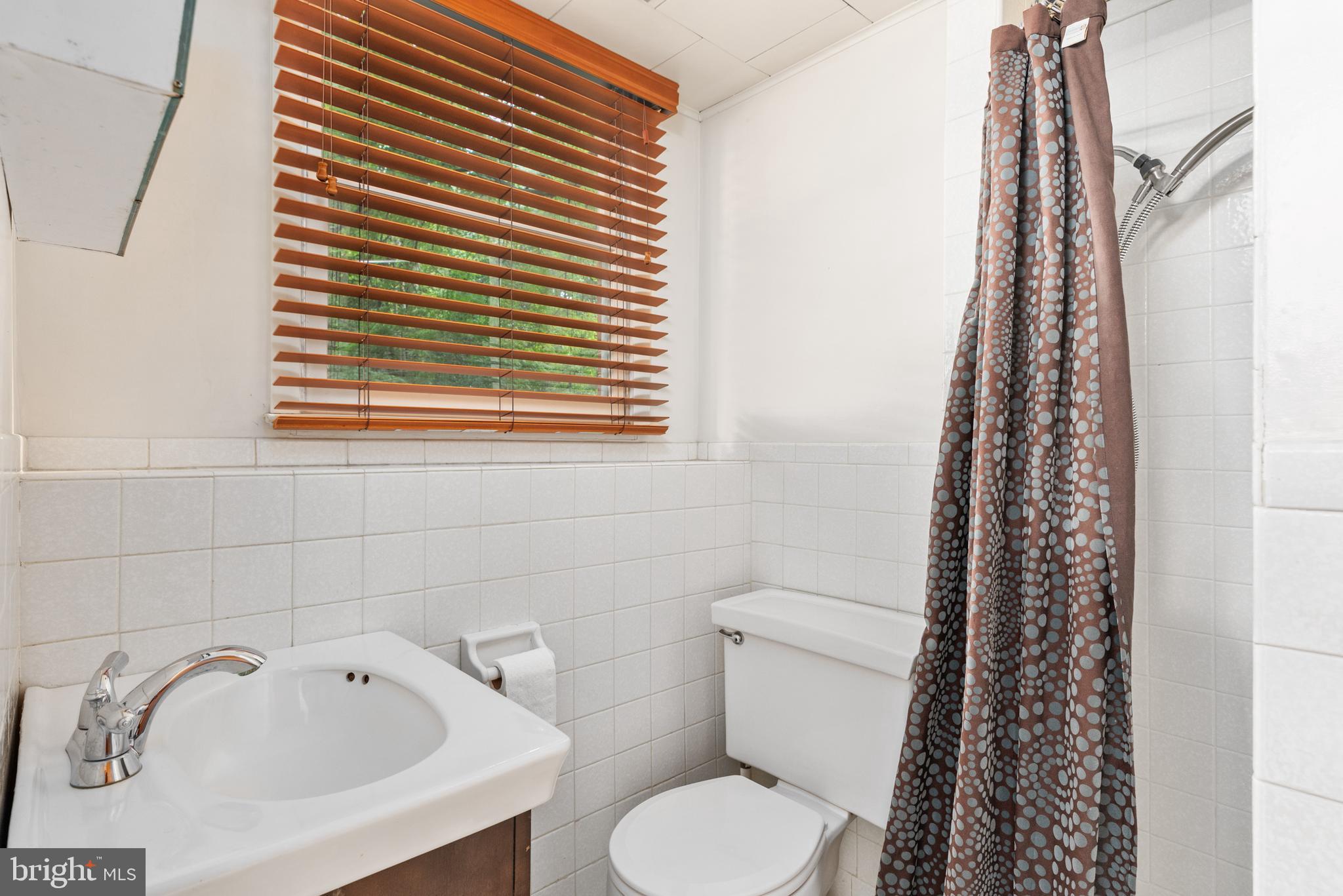 7815 Faulkner Road Severn, MD 21144 - Photo 23 of 32 Full bath w/shower - lower level