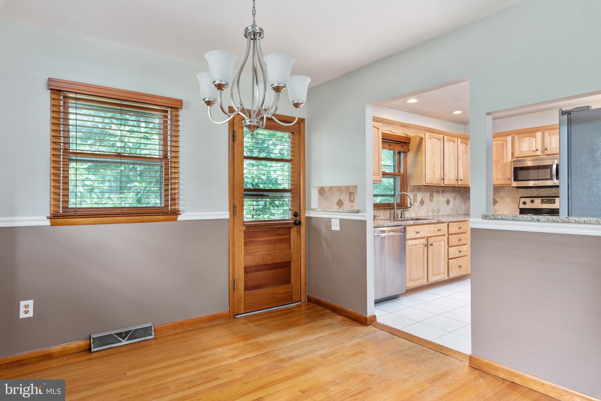 7815 Faulkner Road Severn, MD 21144 - Photo 8 of 32 Kitchen opens up to dining area