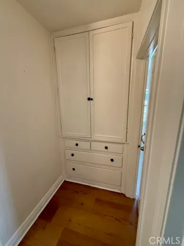 an empty room with cabinet