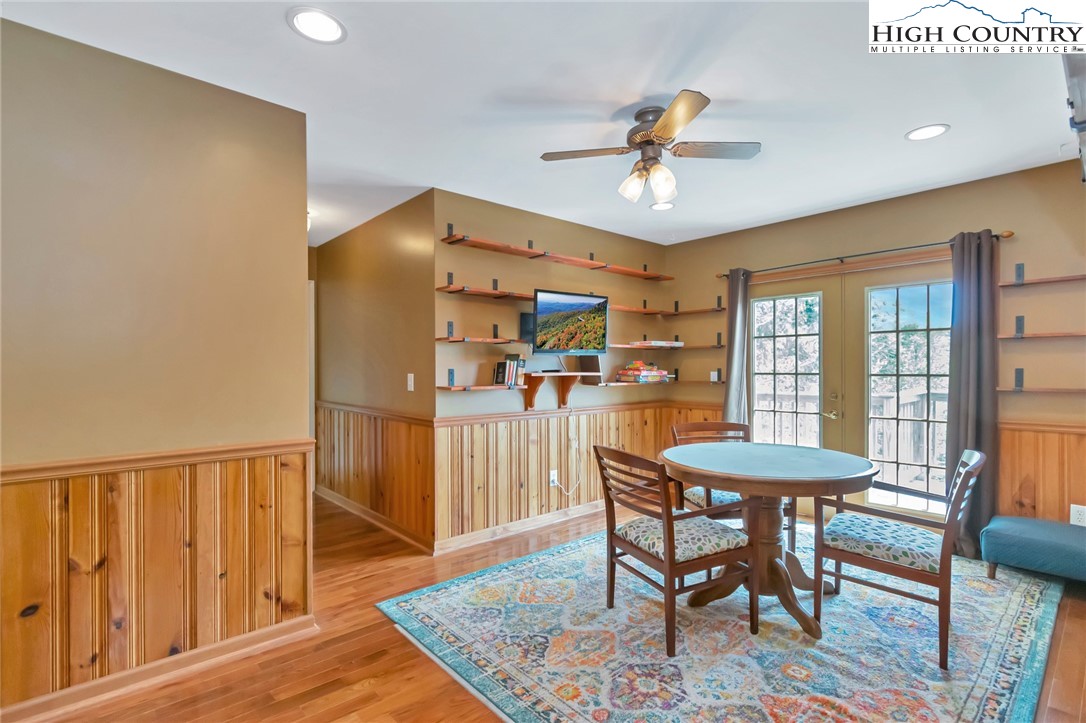 2209-2211 Sugar Mountain 2 Road Newland, NC 28657 - Photo 26 of 50 a dining room with furniture a rug and wooden floor