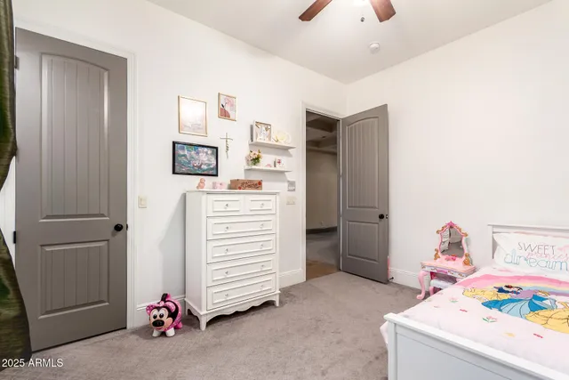 a view of a swimming pool with a lounge chairs