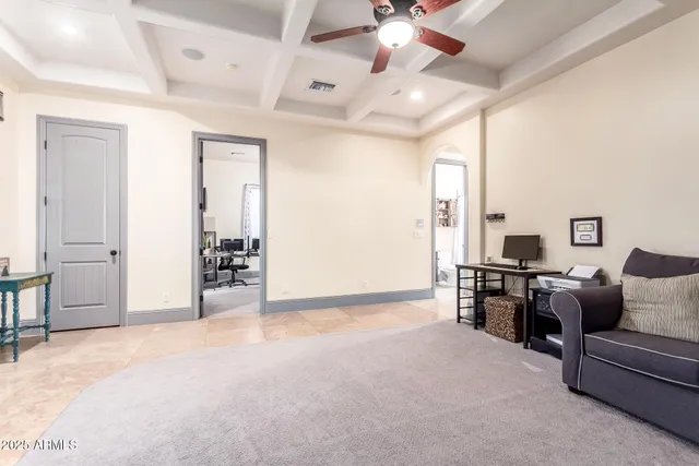 a view of a big house with a big yard and large trees