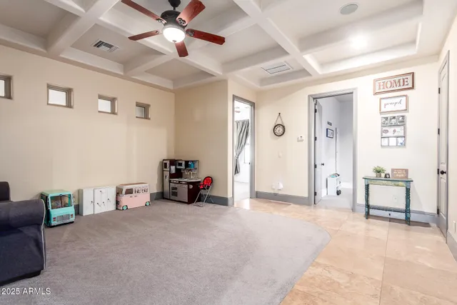 a front view of a house with a yard and a garage