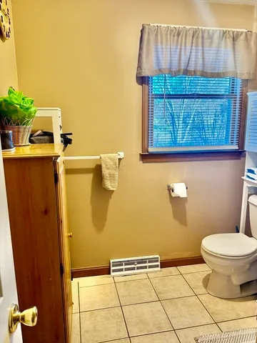 a bathroom with a toilet