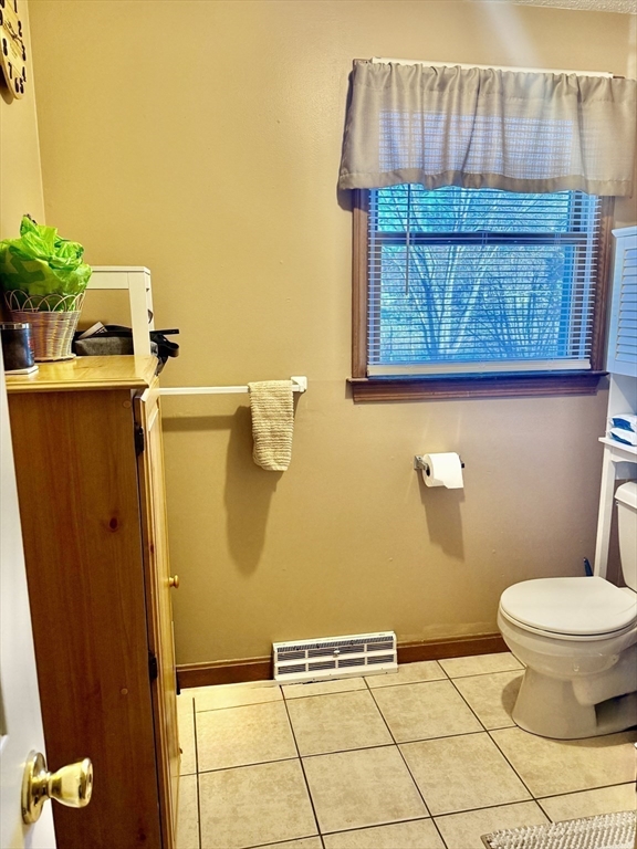 567 Mendon Road, Unit 1 Attleboro, MA 02703 - Photo 6 of 12 a bathroom with a toilet