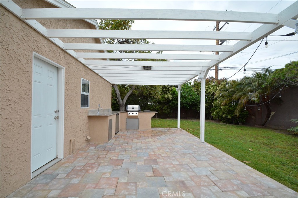 12301 Rives Avenue Downey, CA 90242 - Photo 14 of 20 a view of a porch with a backyard