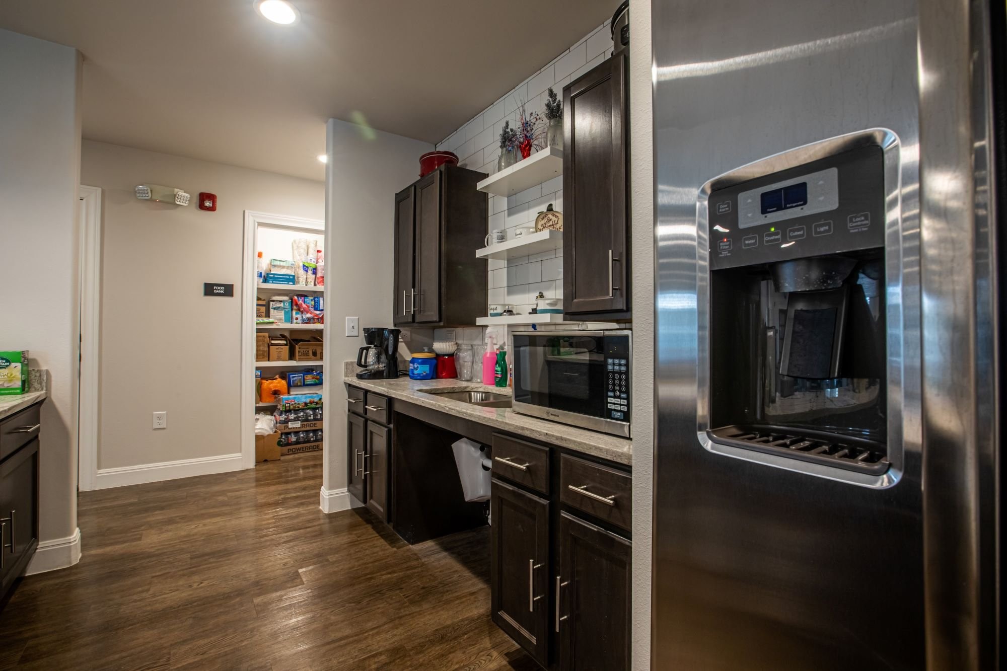 2008 Sam Houston Drive Victoria, TX 77901 - Photo 18 of 29 a kitchen with stainless steel appliances a refrigerator and a stove top oven