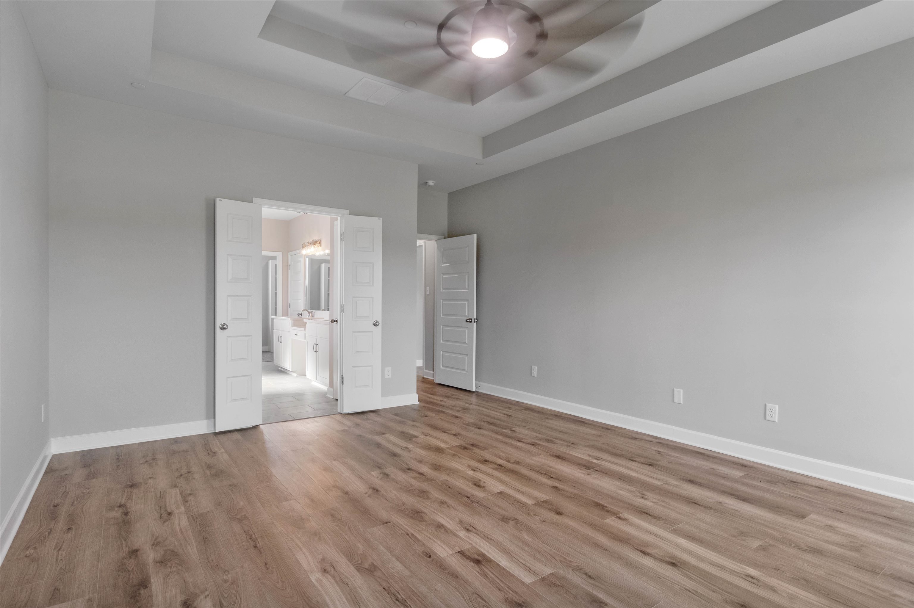 20 Grassy Hill Road Collierville, TN 38017 - Photo 12 of 27 a view of an empty room and wooden floor