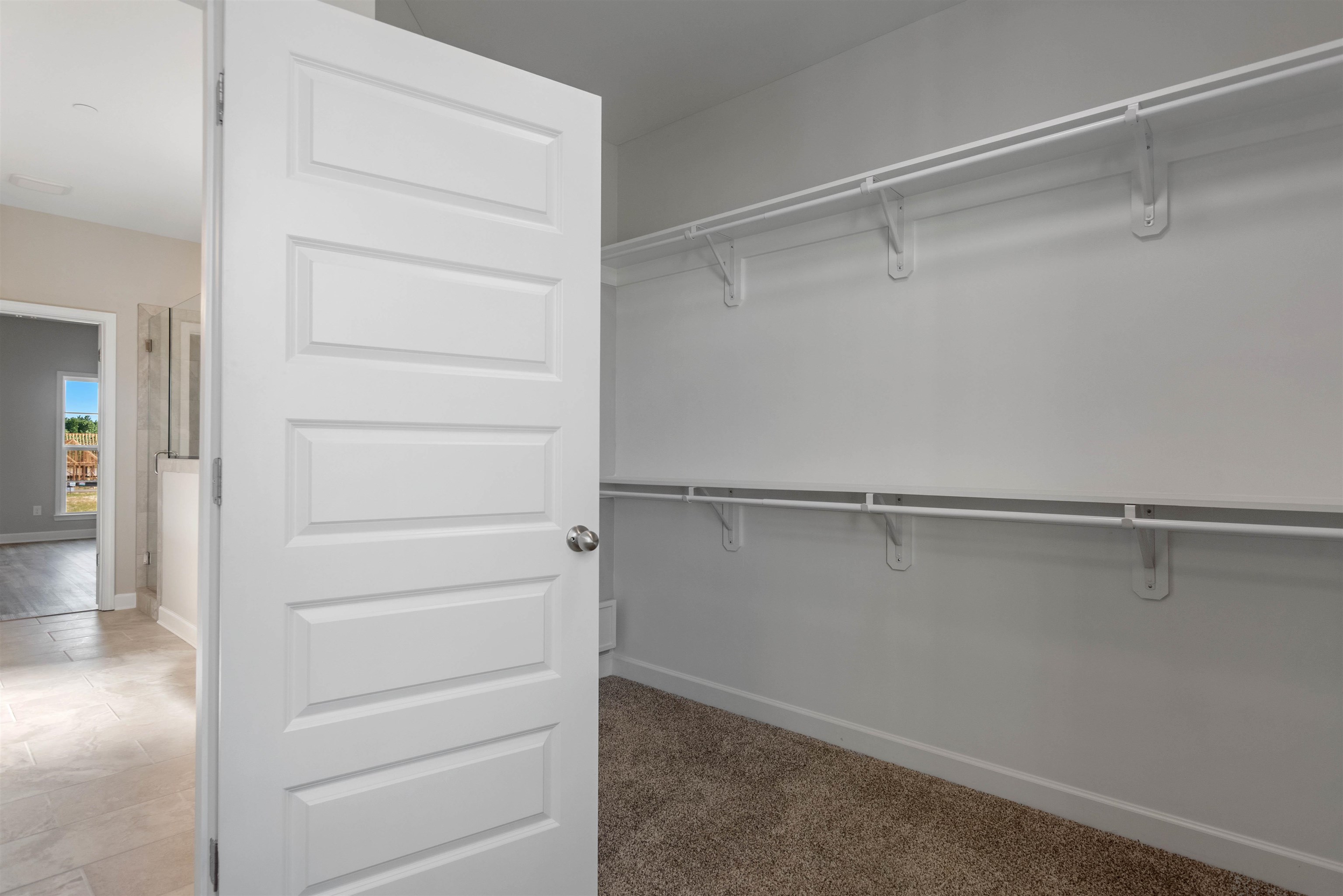 20 Grassy Hill Road Collierville, TN 38017 - Photo 16 of 27 a view of an empty walk in closet