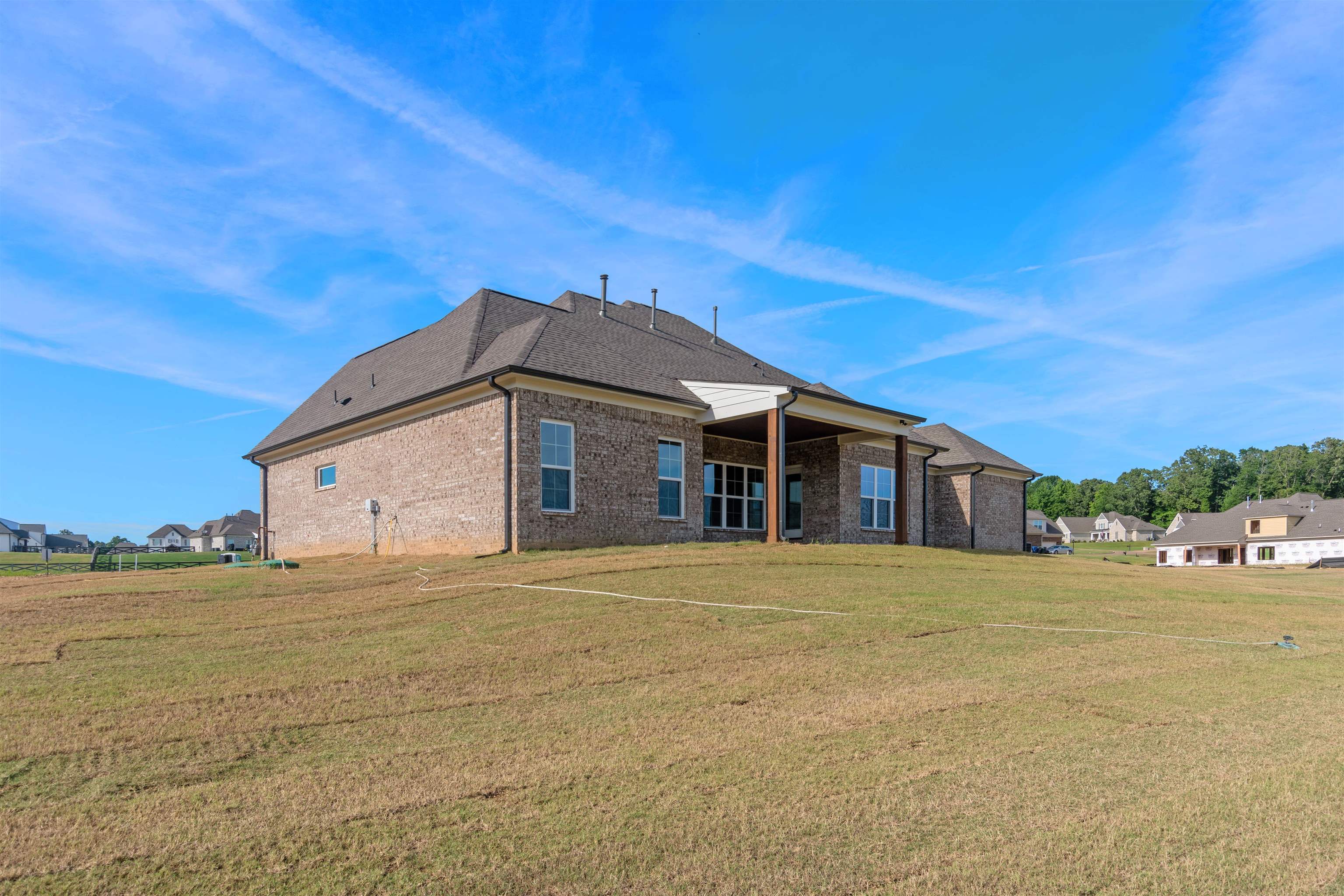 20 Grassy Hill Road Collierville, TN 38017 - Photo 24 of 27 a front view of a house with a garden