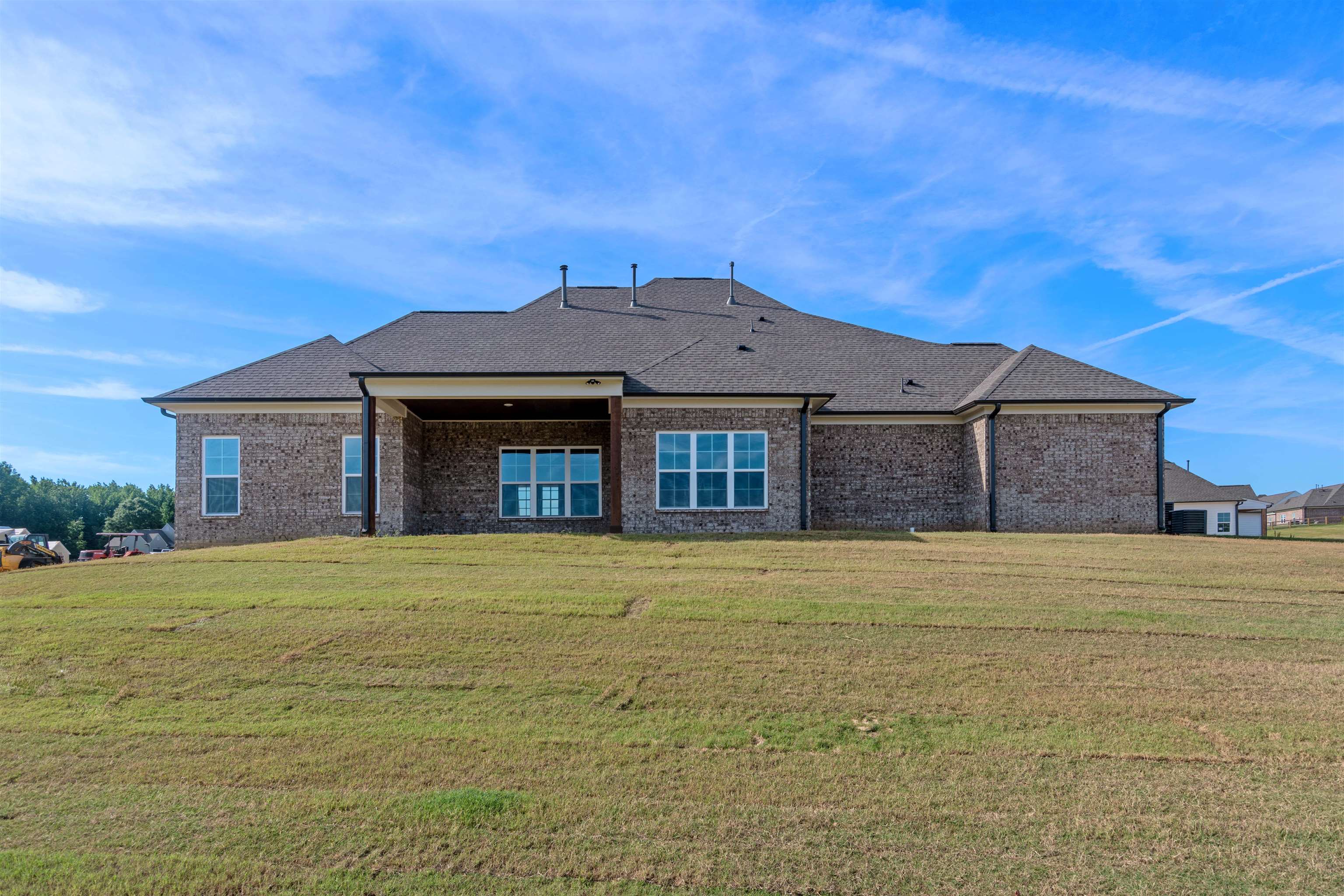 20 Grassy Hill Road Collierville, TN 38017 - Photo 25 of 27 a front view of a house with a yard and garage