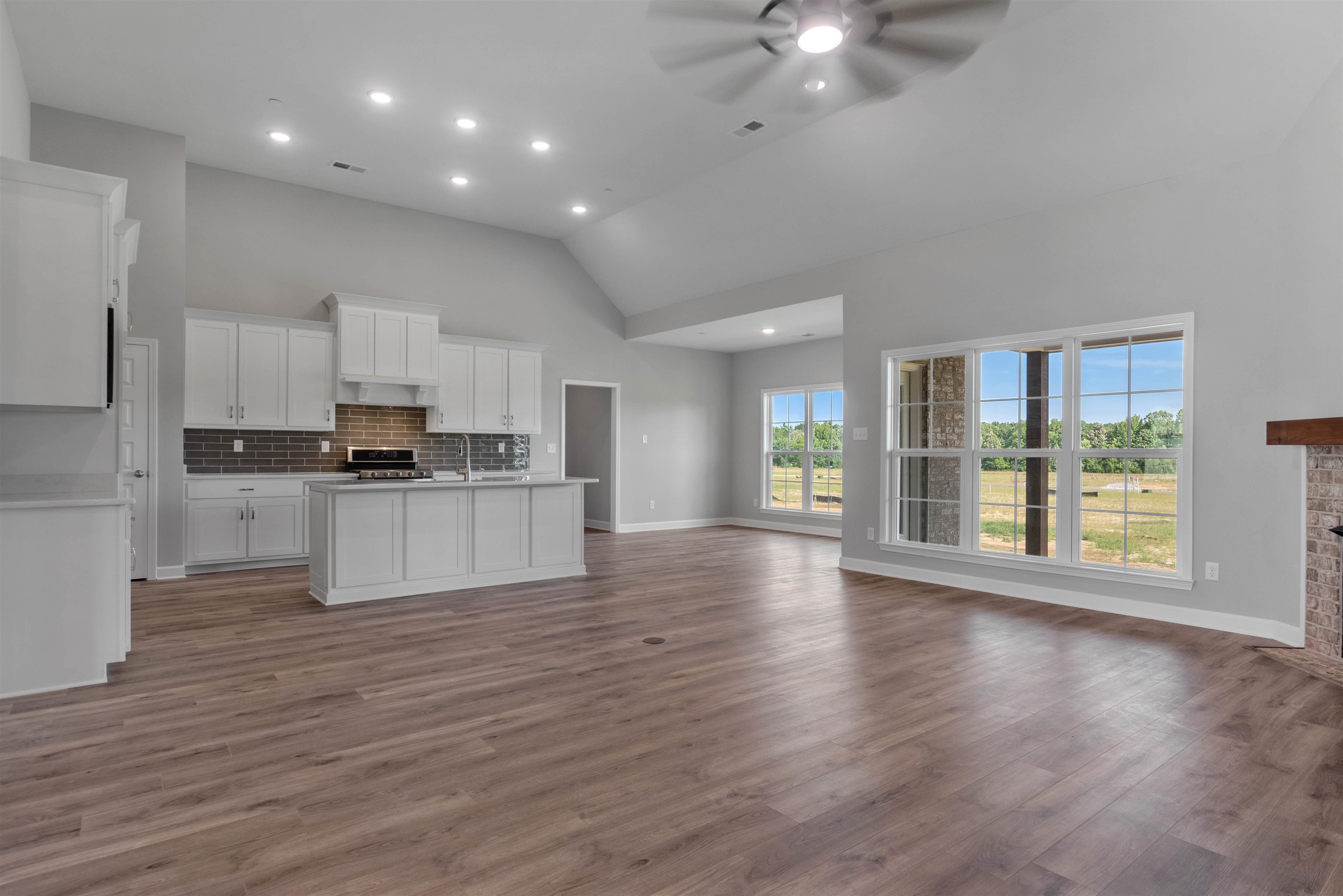 20 Grassy Hill Road Collierville, TN 38017 - Photo 7 of 27 a view of kitchen with granite countertop window and stainless steel appliances